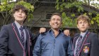 Sam Curwood with sons Jack and Edward outside their new home in Brighton 