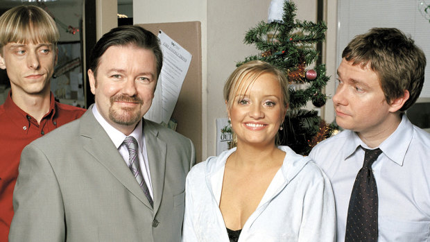 Ricky Gervais (second from left) in his role as needy and narcissistic office boss David Brent. 