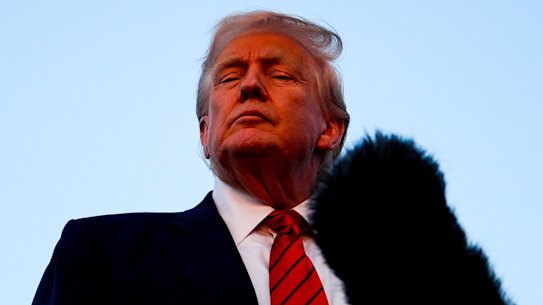 US President Donald Trump speaks to reporters in Pennsylvania on Sunday.