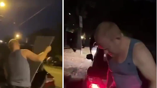 The surgeon was seen ripping down and then stomping on the poster.