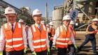 Prime Minister Anthony Albanese (left) and BHP chief executive Mike Henry (second from left) at BHP’s Kwinana nickel refinery in October 2022.