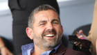Bill Papas made a public appearance at a pre-season match of a football team he owns in Greece on Saturday.
