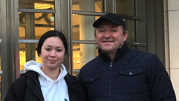 Australian tourists Wayne Burg and his daughter Lydia stand in front of Brooklyn's federal courthouse in New York, where they were viewing the trial of Mexican drug trafficker Joaquin "El Chapo" Guzman.