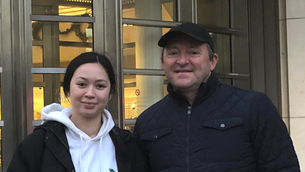 Australian tourists Wayne Burg and his daughter Lydia stand in front of Brooklyn's federal courthouse in New York, where they were viewing the trial of Mexican drug trafficker Joaquin "El Chapo" Guzman.