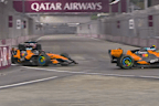Oscar Piastri (L) crashes into the wall after clipping the tyre of teammate Lando Norris (R).