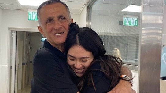 Yaakov Argamani embraces his daughter, Noa Argamani, after her release from captivity. 