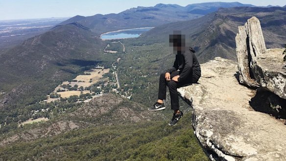 A tourist at Boroka Lookout in the Grampians.