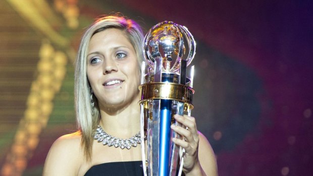 Cafe employee Katrina Gorry with her trophy after winning the Asian Football Confederation Player of the Year and AFC Woman Player of the Year in Manila in 2014.
