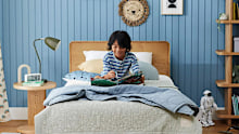 Child sitting in bed