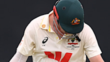 Travis Head reacts after being bowled by Hasan Mahmud.
