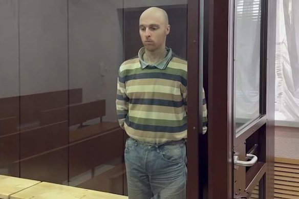 Oscar Jenkins appears before a Russia-controlled court in Luhansk on Friday (Saturday AEST).