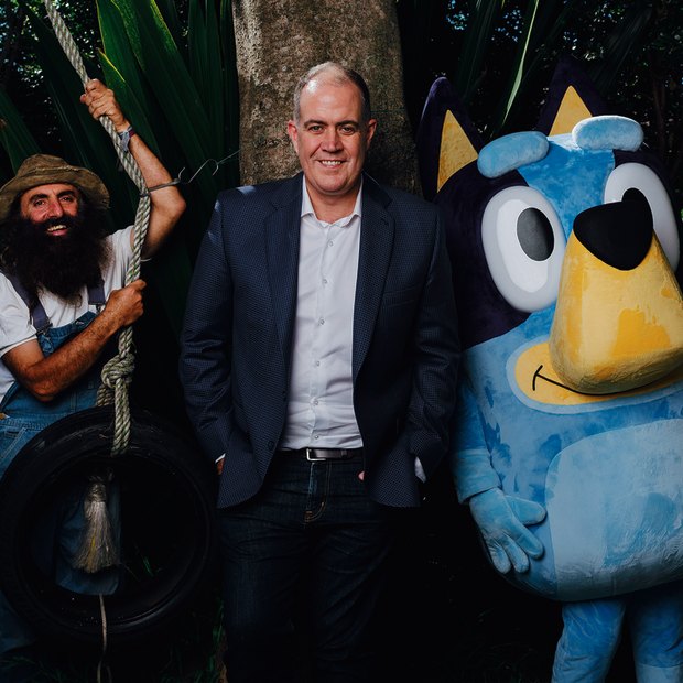 “We upset all sides of politics, simply by holding people to account,” says ABC boss David Anderson, here with Gardening Australia host Costa Georgiadis and Bluey.