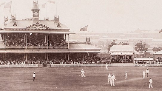 Amazingly, the Australian Star’s photographer captures a blurry Englishman chasing what looks like another sweep to the boundary. Stoddart has set a defensive field with just one slip and several defending the immaculately white picket fence. The SCG’s clock has featured in so many iconic photos. Think Steve Waugh’s famous final-ball century, Shane Warne’s record-breaking wicket. The clock hadn’t even been installed in 1894, but the Test ending was equally historic.
