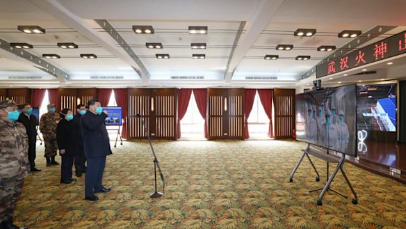 President Xi Jinping talks to coronavirus patients via video link