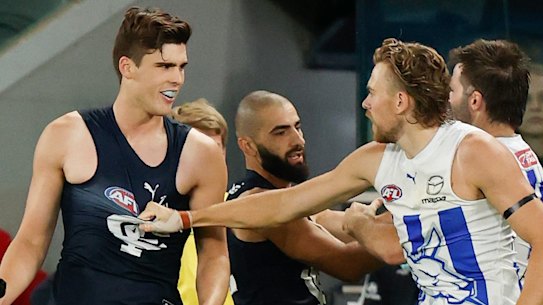 North’s Hugh Greenwood remonstrates with Lewis Young as Cameron Zurhaar lies on the ground.