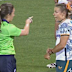 Georgina Friedrichs shows her wrist to the referee.