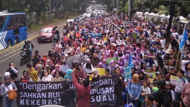 About 2000 people march in Indonesia earlier this month to push for a law to eradicate sexual violence. 
