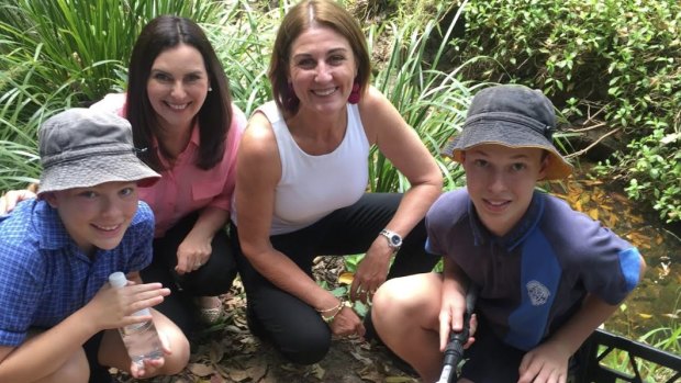 A 12 month revegetation project at Hilder Road state school at The Gap has improved dissolved oxygen.  (From left) Year 6 co-environmental captain Lillian Lambert, Michelle Cull from Queensland Urban Utilities, Julie McLellan from Healthy Land and Water and co-captain Thomas Craik. 