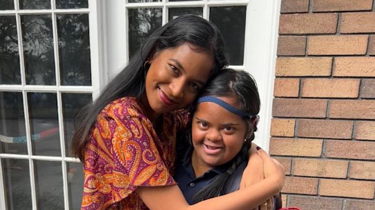 Satara Uthayakumaran and her sister Karuka, who has Down syndrome and is deaf.