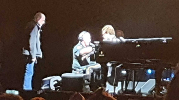 Sir Elton John receiving a medical check at his Auckland concert. 