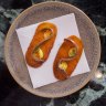Anchovy on crisp potato.