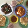 Dishes at Tiong Bahru Hawker Centre including lontong, prata, iced milo and black carrot cake.