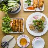 Spring rolls, sugar cane prawns, fresh rice pastry and accompanying fresh herbs and dipping sauce at Phu Quoc, Cabramatta. 