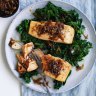 Quick, healthy dinner: Salmon fillets with caramelised onion and wilted greens.