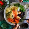 Chinese New Year good luck salad is tossed together at the table.