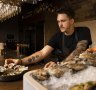 Head chef Nick Mathieson arranging a plate of oysters at The Rover in Surry Hills.