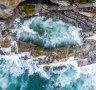 On big swell days, waves crash dramatically into the pool.