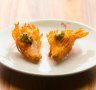 Like a bloomin' onion in miniature: fried shallot with jalapeno cashew sour cream
