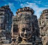 Ancient stone faces of Bayon temple, Angkor, Cambodia.