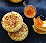 Buttered crumpets with grapefruit and cardamom marmalade (recipe below).