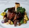 Braised venison shank on cauliflower puree, romanesco and Tuscan kale.