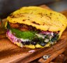 Arepas can be stuffed or topped with a variety of ingredients, from fresh cheese, to shredded meats, to egg or even beans.