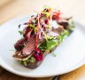Lamb and haloumi open rye with beetroot slaw.