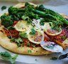 Spicy harissa, broccolini and lemon pizza with cooling whipped feta.