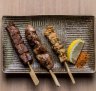 Beef tongue, chicken liver and chicken skin skewers.