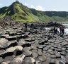 Bushmills: crowd of tourists to see Giant's Causeway.