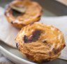 CInnamon and sugar crusted custard tarts.
