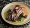 Wagyu flank from Jack's Creek is made autumnal with pan-roasted pine mushrooms and braised kale.