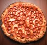 Leonardo's is a dark den for good pizza times
