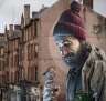 One of Glasgow's best-known murals, by street artist Smug, depicts a modern-day St Mungo which references the story of the Bird That Never Flew. 
