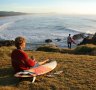 Surfers take to the empty perfect beaches along the Coffs Coast.