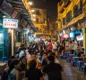 Tourists enjoying night life at Bia Hoi Beer Bars in the old quarter of Hanoi.