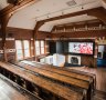 The restored lecture theatre is a great example of heritage features blending with new technology.