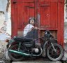Street art Boy On Bike by Ernest Zacharevic.