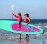 Twin sisters Isabelle and Caroline Tihanyi, founders of Surf Diva – a surfing and stand-up paddle school for women. 