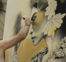 Street artist Fin DAC at Work in Siem Reap.